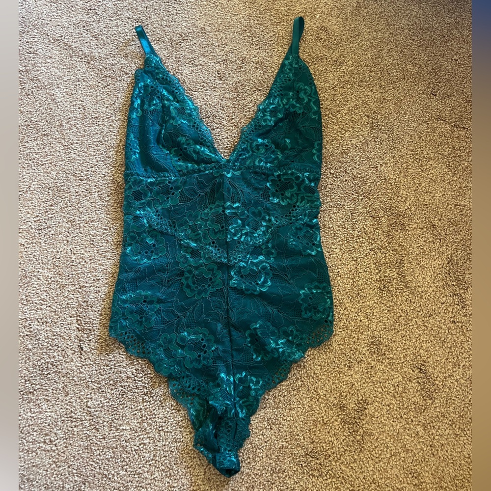 Emerald green lace bodysuit